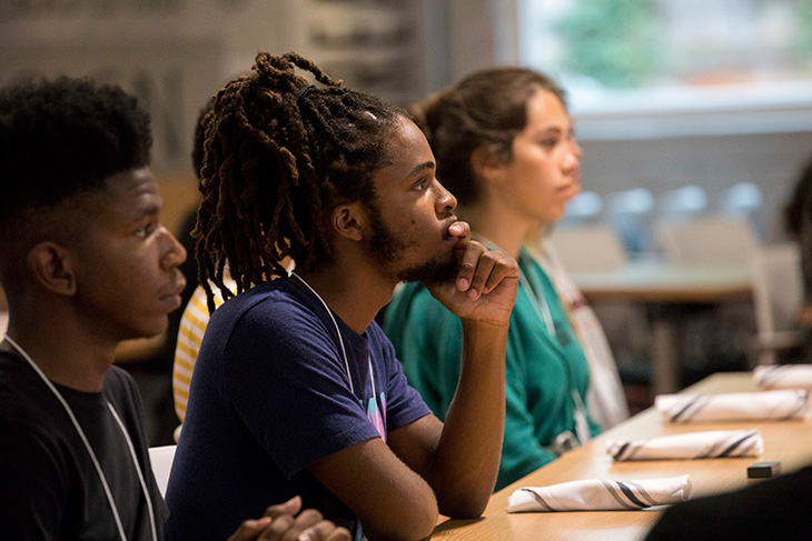 Three students at a desk